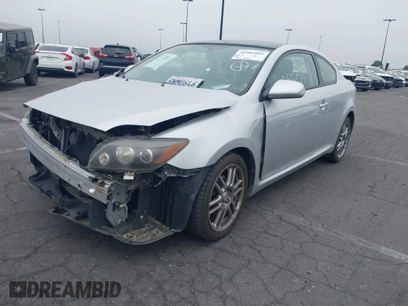 2010 Scion tC with VIN JTKDE3B70A0319343, listed as a IAAI auction lot 41985804 with 133,595 mi miles. Bid and sale history available at carsss.com. Image 2.