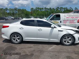 2015 Kia Optima LX with VIN KNAGM4A76F5639319, listed as a IAAI auction lot 42552130 with 207,006 mi miles and . Bid and sale history available at DreamBid. Image 13.