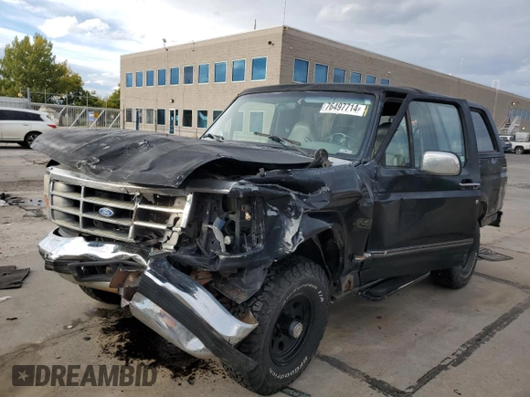 1994 Ford Bronco Custom with VIN 1FMEU15H7RLA79348, listed as a Copart auction lot 76497714 with 204,875 mi miles and Salvage Title. Bid and sale history available at DreamBid. Image 1.