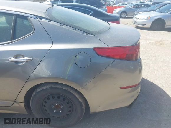 2015 Kia Optima LX z VIN 5XXGM4A70FG463799, wystawiony jako IAAI lot #41815630 z przebiegiem 175 637 mil mil oraz . Historia ofert i sprzedaży dostępna na DreamBid. Obrazek 12.