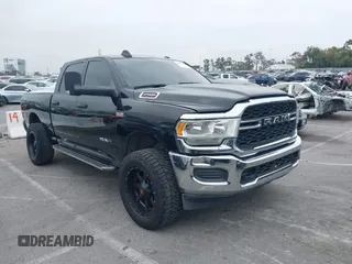 2020 Ram 2500 Tradesman z VIN 3C6UR5CJ1LG284772, wystawiony jako IAAI lot #42509335 z przebiegiem 117 339 mil mil oraz . Historia ofert i sprzedaży dostępna na DreamBid. Obrazek 1.