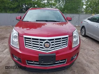 2016 Cadillac SRX Performance Collection z VIN 3GYFNCE39GS504754, wystawiony jako IAAI lot #42290812 z przebiegiem 29 866 mil mil oraz . Historia ofert i sprzedaży dostępna na DreamBid. Obrazek 12.