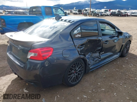 2015 Subaru WRX with VIN JF1VA1A65F9818409, listed as a IAAI auction lot 40895247 with 73,273 mi miles. Bid and sale history available at carsss.com. Image 4.