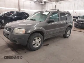 2004 Ford Escape XLT with VIN 1FMYU93174KA69760, listed as a IAAI auction lot 41725347 with 232,740 mi miles and . Bid and sale history available at DreamBid. Image 2.