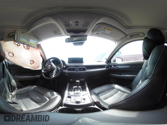2021 Mazda CX-5 Grand Touring with VIN JM3KFADM6M1373111, listed as a IAAI auction lot 42784431 with 14,374 mi miles and . Bid and sale history available at DreamBid. Image 20.