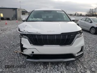 2024 Kia Carnival LX with VIN KNDNB4H39R6432697, listed as a Copart auction lot 82566344 with 7,048 mi miles and Salvage Title. Bid and sale history available at carsss.com. Image 5.