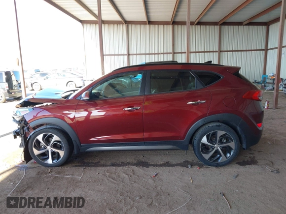2016 Hyundai Tucson Limited with VIN KM8J33A21GU069937, listed as a IAAI auction lot 41861070 with 126,716 mi miles. Bid and sale history available at carsss.com. Image 14.