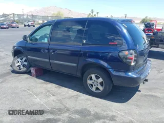 2005 Dodge Caravan SXT with VIN 1D8GP45R65B280660, listed as a IAAI auction lot 42169027 with 246,407 mi miles and . Bid and sale history available at carsss.com. Image 3.