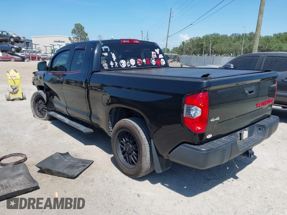 2019 Toyota Tundra SR with VIN 5TFUY5F13KX852912, listed as a IAAI auction lot 42327399 with 124,193 mi miles and . Bid and sale history available at DreamBid. Image 3.