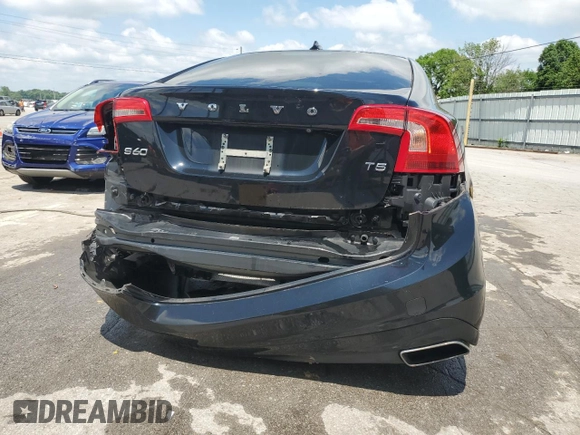 2015 Volvo S60 T5 Drive-E Platinum z VIN YV140MFD4F1314783, wystawiony jako Copart lot #55292105 z przebiegiem 129 818 mil mil oraz Szkoda całkowita • Salvage title. Historia ofert i sprzedaży dostępna na DreamBid. Obrazek 6.
