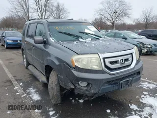 2011 Honda Pilot EX-L with VIN 5FNYF4H65BB009279, listed as a IAAI auction lot 41554301 with 226,337 mi miles and . Bid and sale history available at carsss.com. Image 1.
