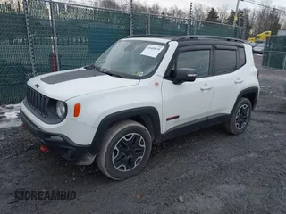 2015 Jeep Renegade Trailhawk with VIN ZACCJBCT5FPB91056, listed as a IAAI auction lot 41609659 with 145,109 mi miles and . Bid and sale history available at DreamBid. Image 2.