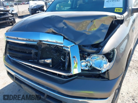 2013 Toyota Tundra with VIN 5TFDW5F11DX284846, listed as a IAAI auction lot 42199103 with 229,535 mi miles and . Bid and sale history available at DreamBid. Image 6.