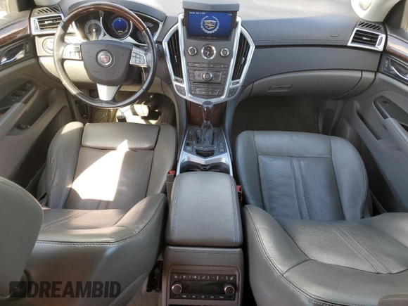 2012 Cadillac SRX Premium Collection with VIN 3GYFNFE39CS515037, listed as a Copart auction lot 55797235 with 146,778 mi miles and Salvage title. Bid and sale history available at DreamBid. Image 8.
