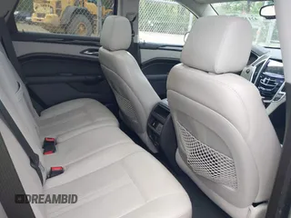 2013 Cadillac SRX Performance Collection z VIN 3GYFNDE35DS636363, wystawiony jako IAAI lot #42147483 z przebiegiem 116 894 mil mil oraz . Historia ofert i sprzedaży dostępna na DreamBid. Obrazek 8.
