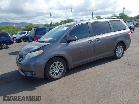 2014 Toyota Sienna XLE with VIN 5TDYK3DC2ES438980, listed as a IAAI auction lot 42067750 with 143,728 mi miles and . Bid and sale history available at DreamBid. Image 17.