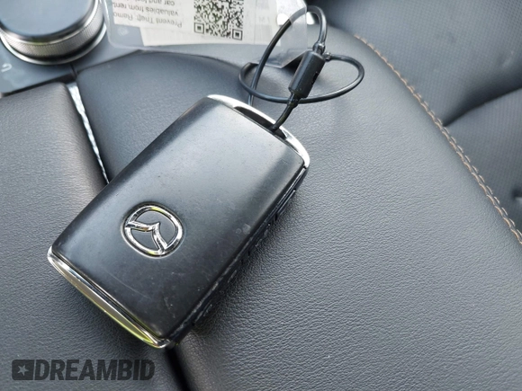 2024 Mazda CX-90 S с VIN JM3KK1HC0R1135680, выставлен на аукционе IAAI как лот 42492399 с пробегом 38 940 миль миль и . История ставок и продаж доступна на DreamBid. Изображение 11.