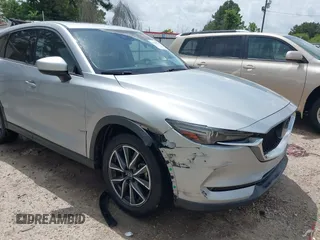 2018 Mazda CX-5 Grand Touring with VIN JM3KFADM6J0339185, listed as a IAAI auction lot 42160763 with 86,312 mi miles and . Bid and sale history available at DreamBid. Image 6.