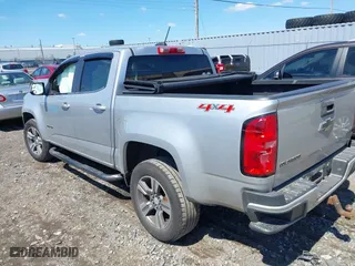2015 Chevrolet Colorado 4WD LT with VIN 1GCGTBE36F1125107, listed as a IAAI auction lot 39514133 with 105,116 mi miles. Bid and sale history available at carsss.com. Image 3.