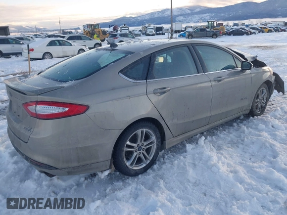 2016 Ford Fusion SE Hybrid with VIN 3FA6P0LU8GR127311, listed as a IAAI auction lot 41242945 with 1 mi miles. Bid and sale history available at carsss.com. Image 4.