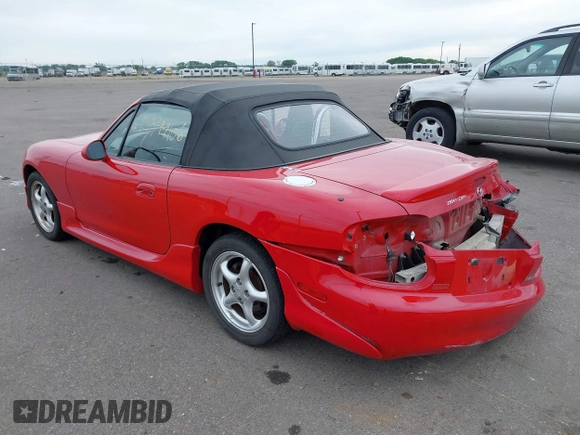 2002 Mazda MX-5 Miata Cloth with VIN JM1NB353220229173, listed as a IAAI auction lot 42344106 with 153,242 mi miles and . Bid and sale history available at DreamBid. Image 3.
