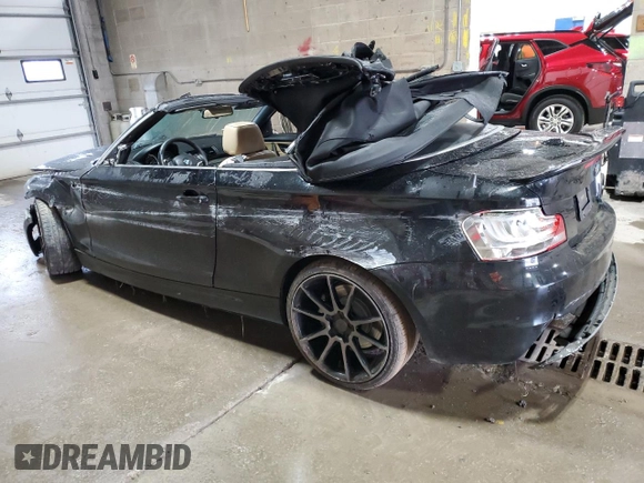 2013 BMW 1 Series 135i with VIN WBAUN7C5XDVM26903, listed as a Copart auction lot 60525595 with 219,810 mi miles and Salvage title. Bid and sale history available at DreamBid. Image 2.