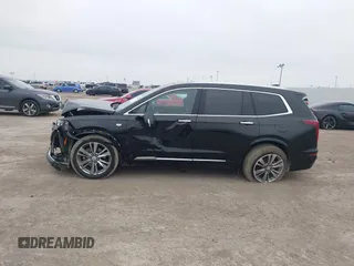 2023 Cadillac XT6 FWD Premium Luxury with VIN 1GYKPCRS8PZ231089, listed as a IAAI auction lot 41500954 with 36,455 mi miles and . Bid and sale history available at DreamBid. Image 14.