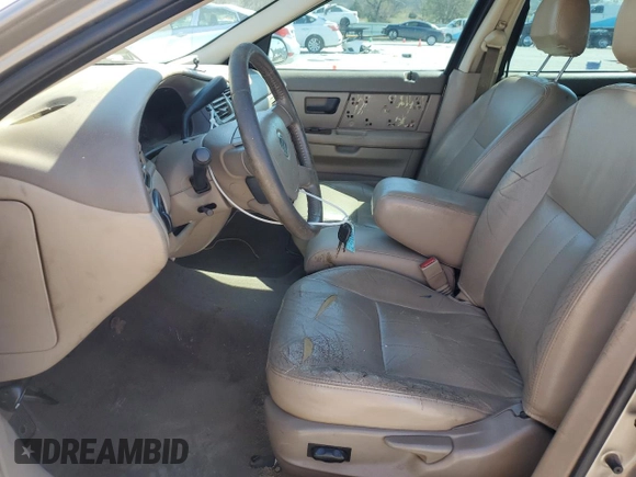 2004 Mercury Sable LS Premium z VIN 1MEFM55S34G611027, wystawiony jako Copart lot #50611585 z przebiegiem 224 081 mil mil oraz Czysty tytuł • Clean title. Historia ofert i sprzedaży dostępna na DreamBid. Obrazek 7.