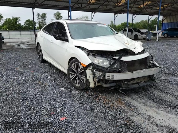 2016 Honda Civic EX-T с VIN 2HGFC1F35GH641158, выставлен на аукционе Copart как лот 59027175 с пробегом Не указан миль и Списание • Salvage title. История ставок и продаж доступна на DreamBid. Изображение 13.