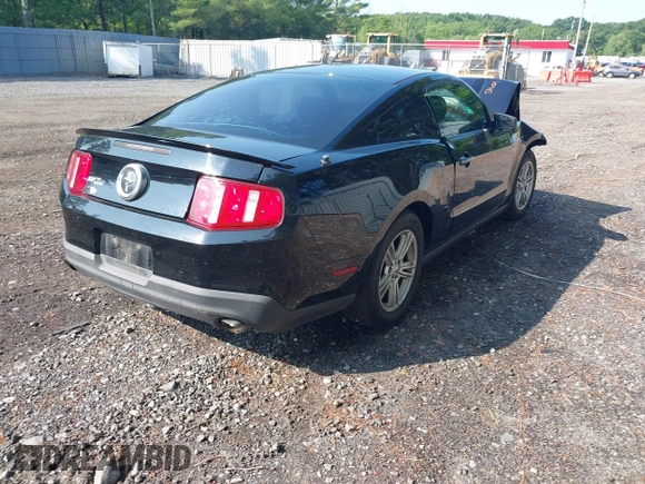 2012 Ford Mustang Premium with VIN 1ZVBP8AM1C5288023, listed as a IAAI auction lot 42486009 with 143,525 mi miles and . Bid and sale history available at DreamBid. Image 4.