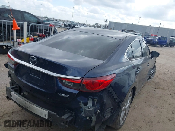2017 Mazda Mazda6 Touring with VIN JM1GL1V54H1107722, listed as a IAAI auction lot 41521257 with 142,129 mi miles. Bid and sale history available at carsss.com. Image 4.