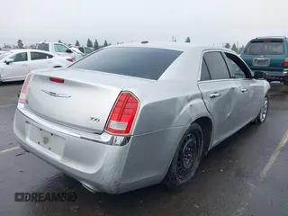 2011 Chrysler 300 Limited with VIN 2C3CA5CG9BH614354, listed as a IAAI auction lot 41216730 with 141,670 mi miles. Bid and sale history available at carsss.com. Image 4.
