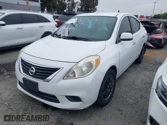 2014 Nissan Versa SV with VIN 3N1CN7AP0EL869083, listed as a IAAI auction lot 42044279 with 143,568 mi miles. Bid and sale history available at carsss.com. Image 2.