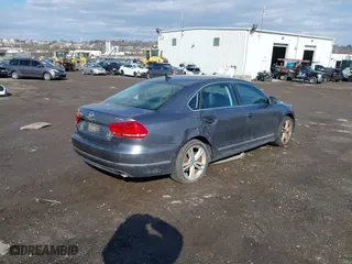 2013 Volkswagen Passat SEL Premium with VIN 1VWCM7A32DC063184, listed as a IAAI auction lot 41505096 with 121,482 mi miles. Bid and sale history available at carsss.com. Image 4.