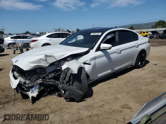 2019 BMW M5 z VIN WBSJF0C56KB446714, wystawiony jako Copart lot #52604265 z przebiegiem 63 401 mil mil oraz Szkoda całkowita • Salvage title. Historia ofert i sprzedaży dostępna na DreamBid. Obrazek 1.