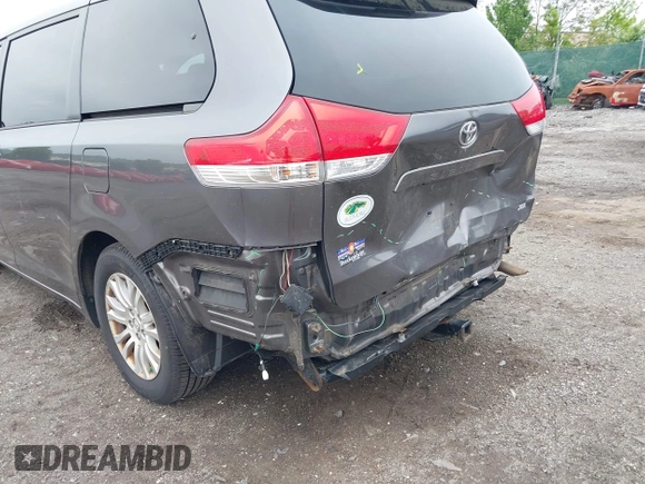 2014 Toyota Sienna XLE with VIN 5TDYK3DC0ES436502, listed as a IAAI auction lot 42180990 with 154,839 mi miles and . Bid and sale history available at DreamBid. Image 20.