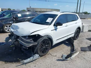 2022 Volkswagen Tiguan SE R-Line Black with VIN 3VVCB7AX5NM009696, listed as a IAAI auction lot 42364884 with 45,380 mi miles and . Bid and sale history available at DreamBid. Image 16.