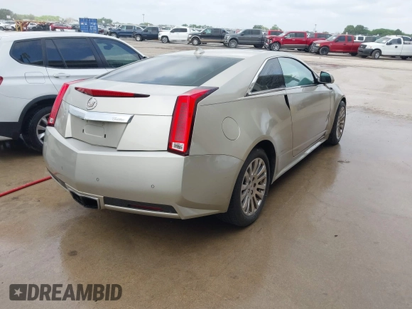 2013 Cadillac CTS Coupe Premium with VIN 1G6DS1E36D0107566, listed as a IAAI auction lot 42079197 with 122,386 mi miles. Bid and sale history available at carsss.com. Image 4.