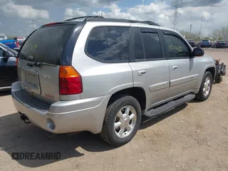 2005 GMC Envoy SLE z VIN 1GKDT13S852271545, wystawiony jako IAAI lot #42117632 z przebiegiem 213 355 mil mil oraz . Historia ofert i sprzedaży dostępna na DreamBid. Obrazek 4.