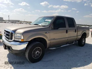2002 Ford F-350 XL with VIN 3FTSW31F62MA15436, listed as a Copart auction lot 75384314 with 284,637 mi miles and Salvage Title. Bid and sale history available at DreamBid. Image 1.