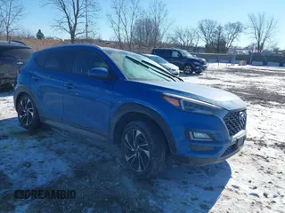 2019 Hyundai Tucson Sport with VIN KM8J33ALXKU857925, listed as a IAAI auction lot 41369786 with 41,365 mi miles. Bid and sale history available at carsss.com. Image 1.