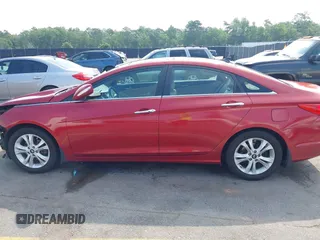 2012 Hyundai Sonata Limited z VIN 5NPEC4AC8CH425163, wystawiony jako IAAI lot #42297206 z przebiegiem 159 946 mil mil oraz . Historia ofert i sprzedaży dostępna na DreamBid. Obrazek 14.