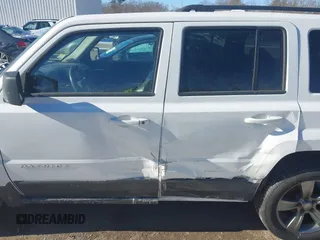 2015 Jeep Patriot High Altitude with VIN 1C4NJRFB3FD106105, listed as a IAAI auction lot 41187988 with 149,528 mi miles and . Bid and sale history available at carsss.com. Image 14.