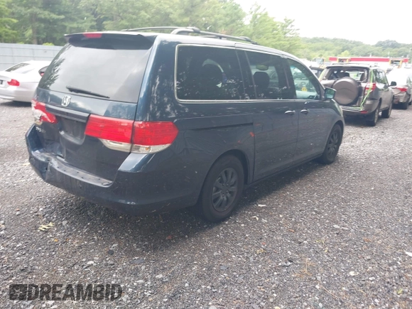 2010 Honda Odyssey EX with VIN 5FNRL3H46AB080950, listed as a IAAI auction lot 42658218 with 185,742 mi miles and . Bid and sale history available at DreamBid. Image 4.
