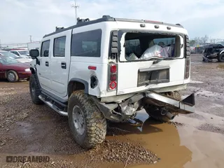 2004 Hummer H2 with VIN 5GRGN23U64H122670, listed as a IAAI auction lot 41908517 with 189,736 mi miles. Bid and sale history available at carsss.com. Image 3.