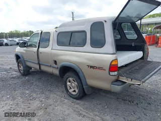 2002 Toyota Tundra SR5 with VIN 5TBBT44112S292924, listed as a IAAI auction lot 41958993 with 216,550 mi miles. Bid and sale history available at carsss.com. Image 3.