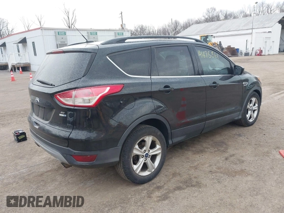 2015 Ford Escape SE with VIN 1FMCU9G90FUC66187, listed as a IAAI auction lot 41678861 with 284,548 mi miles and . Bid and sale history available at DreamBid. Image 4.