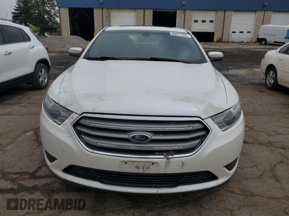 2015 Ford Taurus SEL z VIN 1FAHP2E89FG100466, wystawiony jako Copart lot #56887395 z przebiegiem 109 233 mil mil oraz Szkoda całkowita • Salvage title. Historia ofert i sprzedaży dostępna na DreamBid. Obrazek 5.