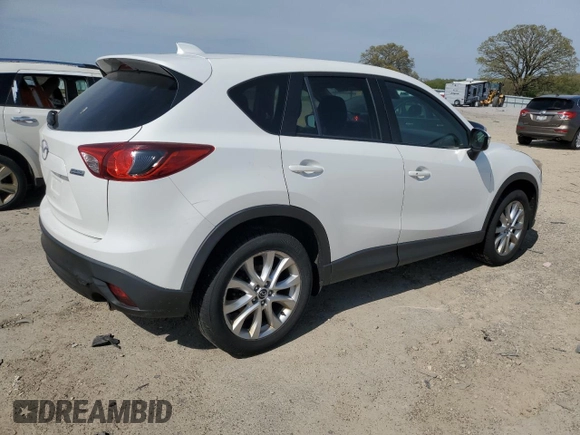 2015 Mazda CX-5 Grand Touring with VIN JM3KE4DY3F0496994, listed as a Copart auction lot 56093965 with 184,256 mi miles and Non Repairable. Bid and sale history available at DreamBid. Image 3.