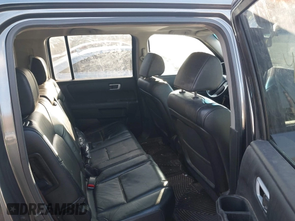 2012 Honda Pilot EX-L with VIN 5FNYF4H52CB034259, listed as a IAAI auction lot 41871625 with 159,577 mi miles and . Bid and sale history available at carsss.com. Image 8.